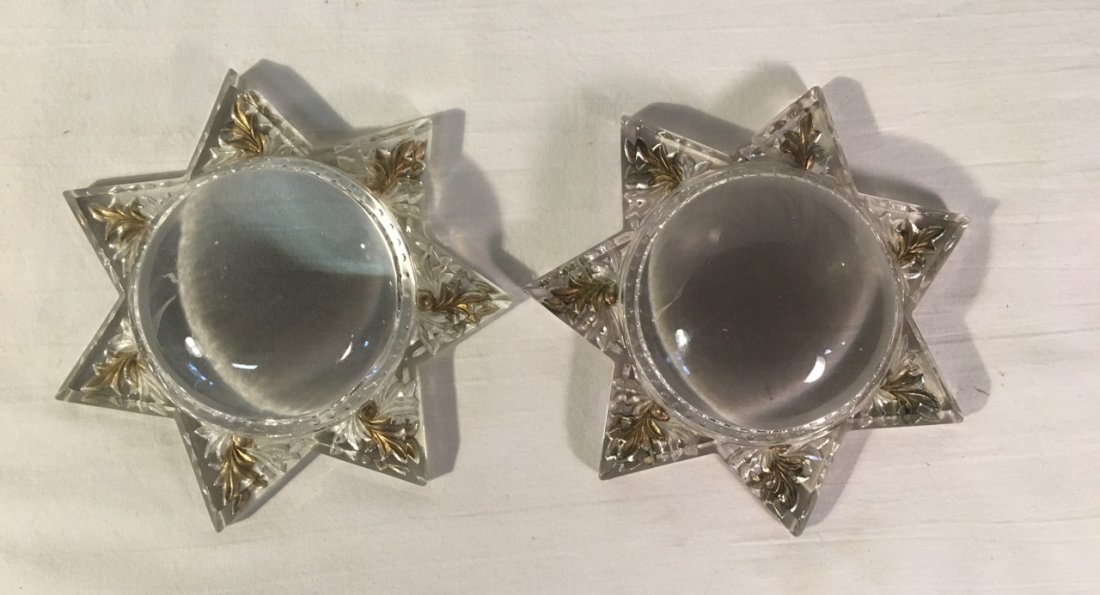 Pair of domed star shaped pressed glass magnifier: Pair of domed star shaped pressed glass magnifier readers/paperweights Gold leafed detailing 5.5" in dia 1915-1920 Please note that this lot has a confidential reserve. When you leave a bid in advance