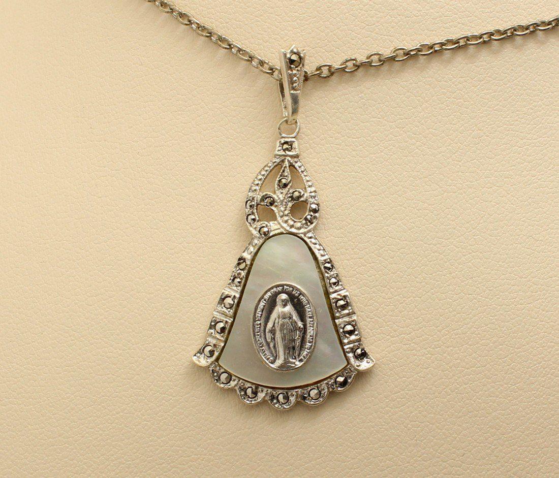 Vintage Silver Mother of Pearl Virgin Mary Pendant: This is a beautiful vintage Ann Gale virgin Mother Mary Immaculate Conception Miraculous medal religious pendant medal on a bell shaped mother of pearl and sterling silver pendant studded with marcasi