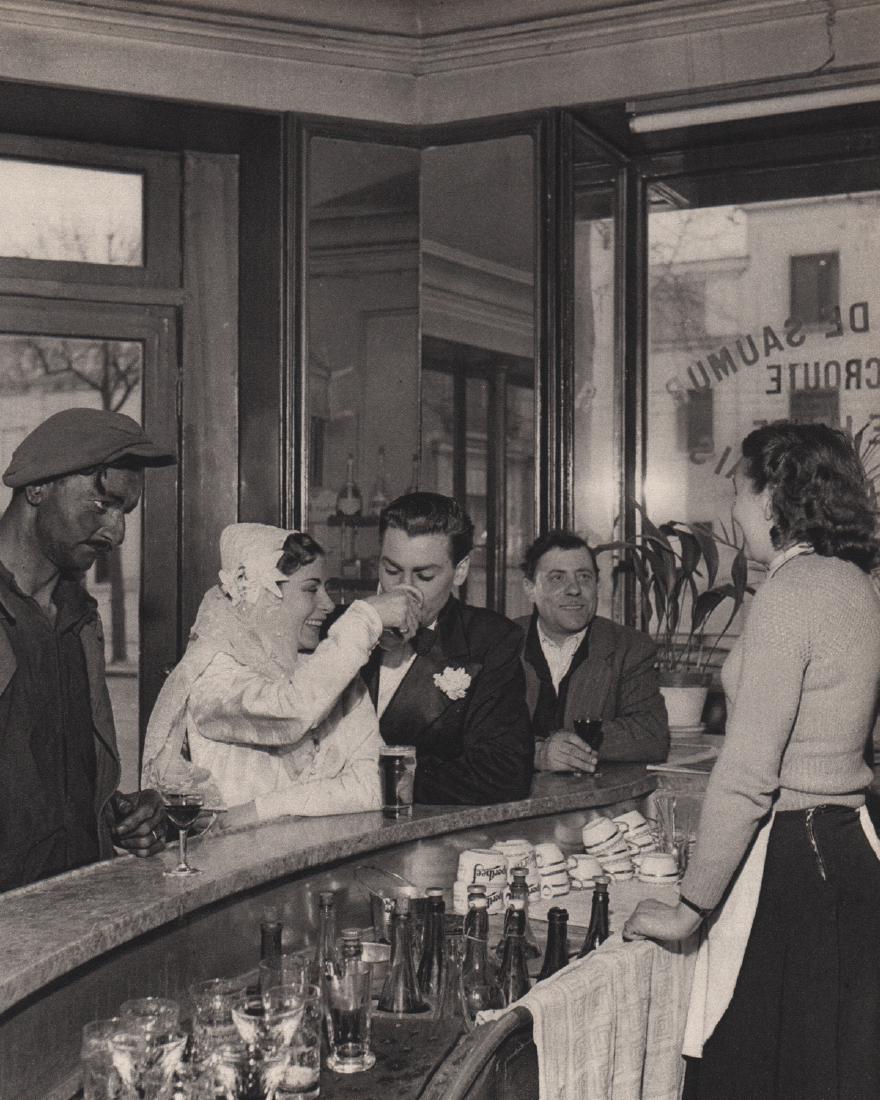 ROBERT DOISNEAU - Wedding at the Bistro: Artist: ROBERT DOISNEAU Print Title: Wedding at the Bistro in Montrouge Paris Medium: Sheet-fed Gravure Printing Date: 1949 Printing Location: Switzerland Image Size: 6.5 x 8.25 inches Robert Doisneau