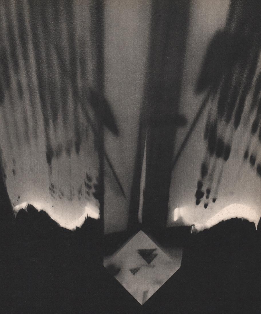 MAN RAY - Rayograph: Artist: MAN RAY Print Title: Rayograph Medium: Sheet-fed Gravure Printing Date: 1934 Printed in France Image size approx. 8.5 x 10 inches Man Ray, original name Emmanuel Radnitzky, was born on August