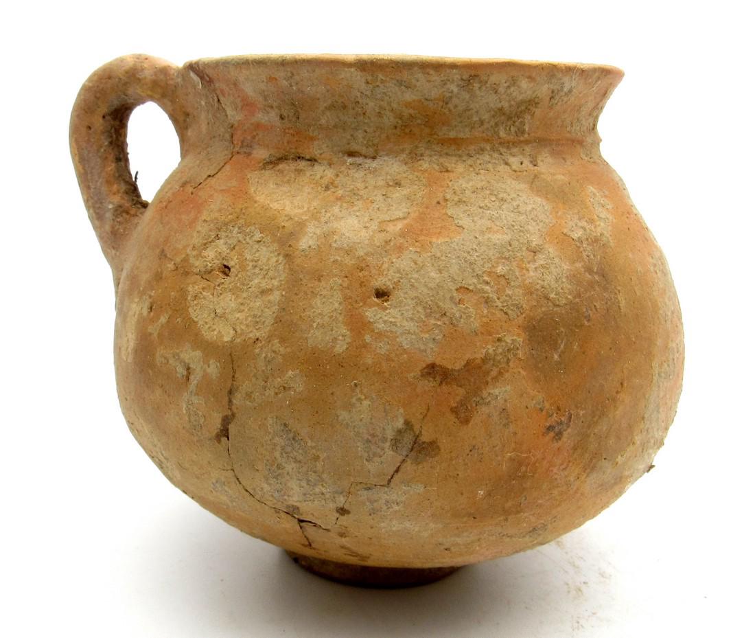 Ancient Roman Wine Cup with a Handle: Material: terracotta Provenance: Obtained from an old Austrian Collection: purchased in Vienna. Dimensions: 90x75mm; 91.5grams Roman legionary terracota wine cup with handle. Very nice details. In fan