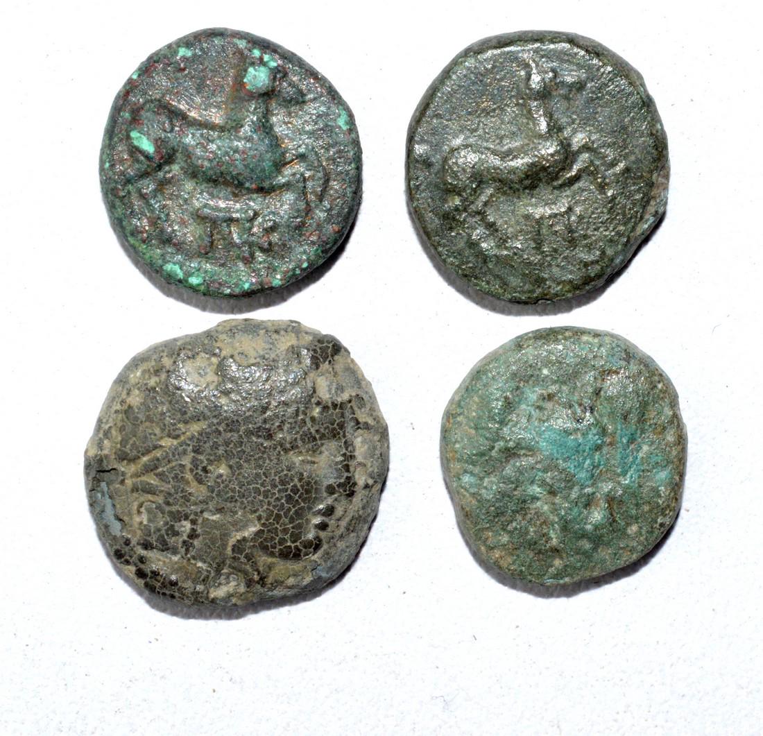 Lot of 4 Ancient Greek Coins for Cleaning: Date: ca. 4th - 2nd C BC Material: Copper / Bronze Origin: From an old British collectom, acquired on German and Austrian art markets. Dimensions: 13-18mm; 15.8grams Lot of 4 Ancient Greek Coins for C