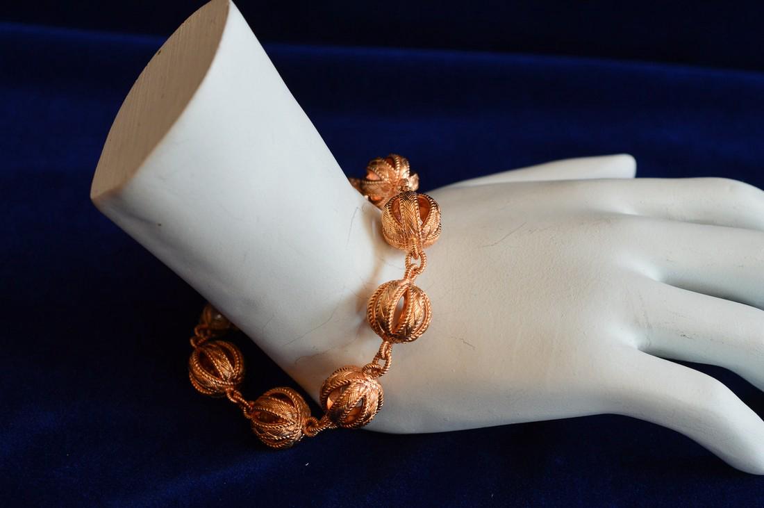 Judith Ripka Rose Gold Clad Truffle Bead Bracelet: Item: Ladies Judith Ripka Rose Gold Clad Truffle Bead Bracelet Brand: Judith Ripka Metal Purity: .925 sterling silver Gemstones: N/A Carat Weights: N/A Size: 7.5" Rose gold clad truffle bead are 12mm