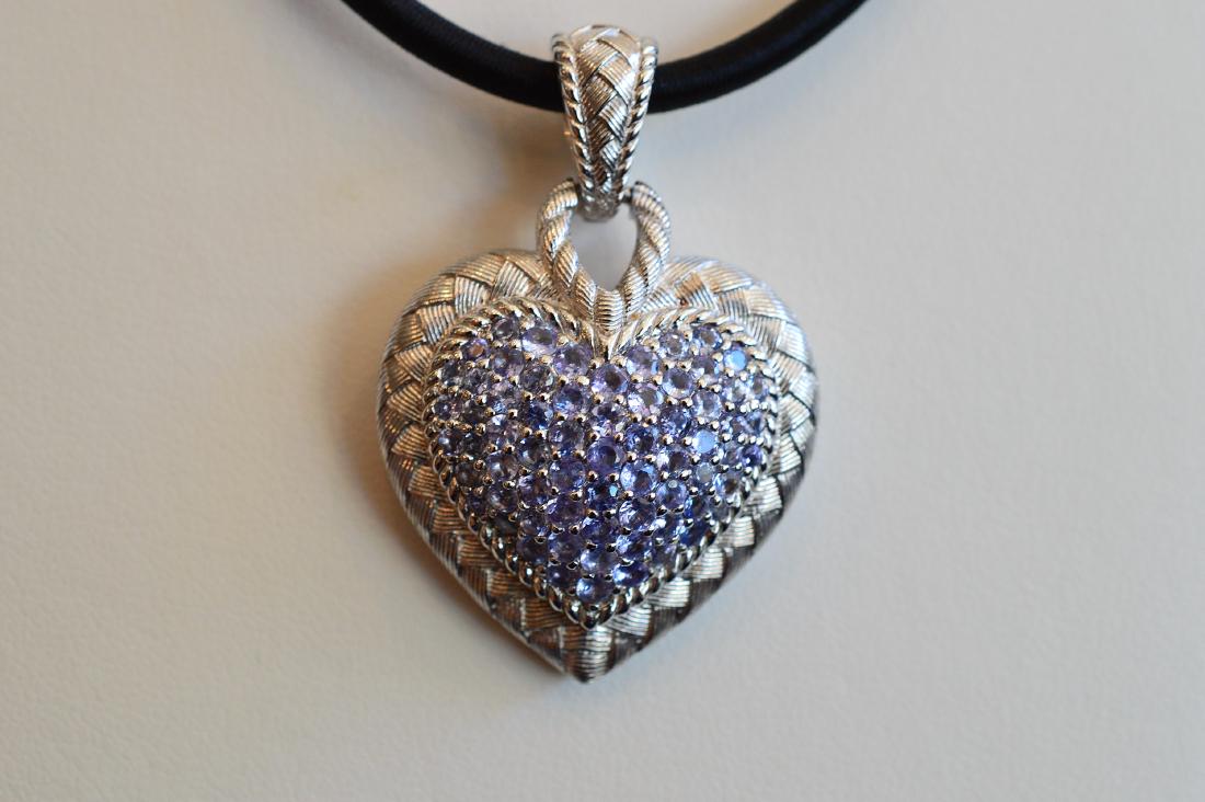 Judith Ripka Sterling Cubic Zirconia Heart Pendant: Item: Ladies Judith Ripka Sterling Silver Heart Necklace Enhancer with Blue Cubic Zirconia Brand: Judith Ripka Metal Purity: .925 sterling silver Gemstones: N/A Carat Weights: N/A Size: 29mm wide x 41