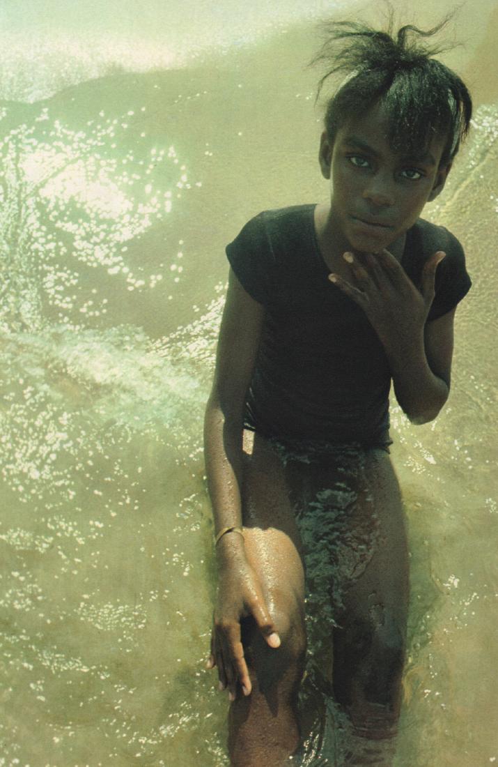 MARY ELLEN MARK - Young Girl in the Water: Artist: MARY ELLEN MARK Print Title: Young Girl in the Water Medium: Color Sheet-fed Gravure Printing Date: 1969 Printed: Italy Image Size: 8.5 X 13 inches Mary Ellen Mark(1940-2015) was an American p