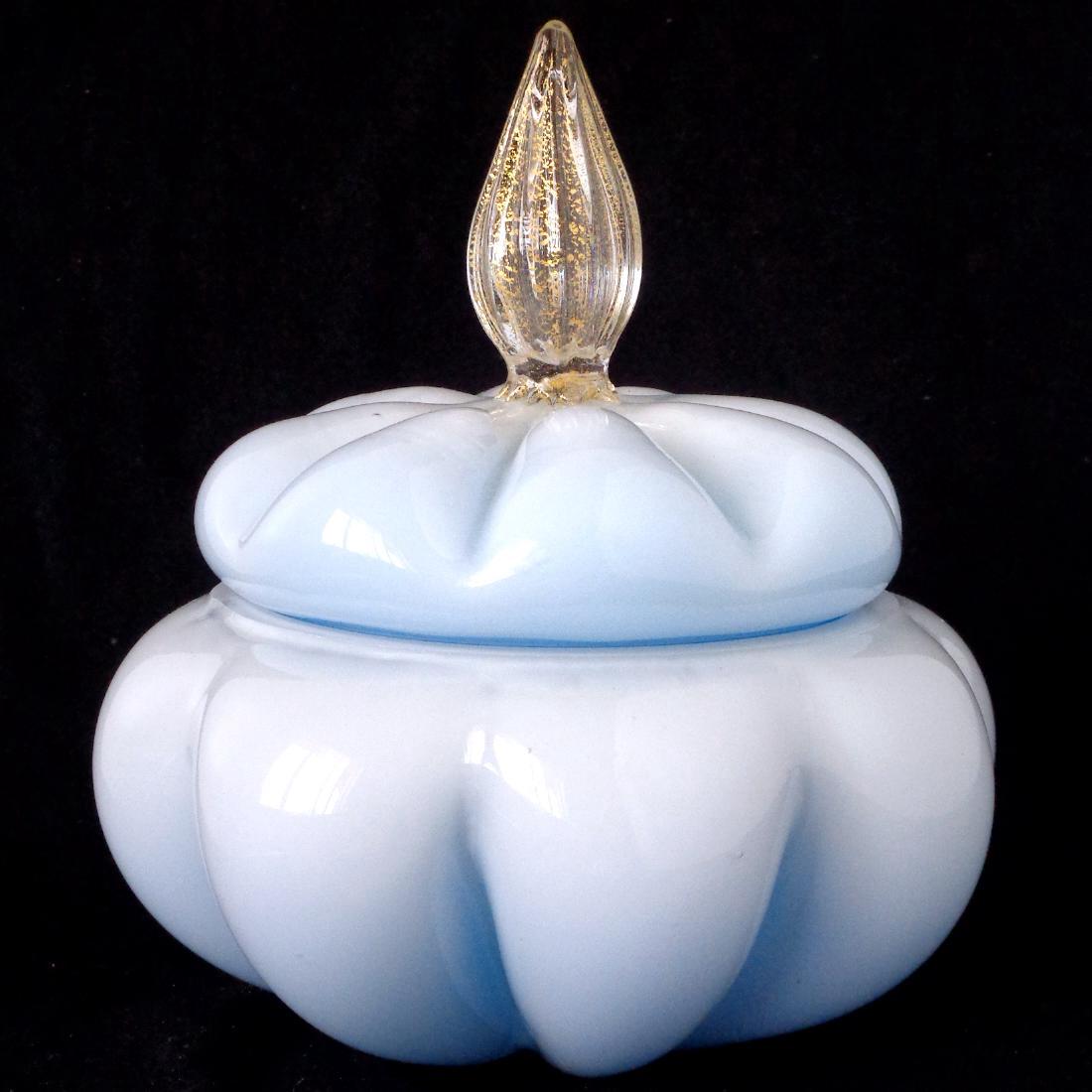 Murano White Blue Gold Flecks Art Glass Powder Box: Murano hand blown white over bright blue art glass powder box with gold finial decoration. Perfect for any Vanity or side table. Has a small nick on the inside rim of the bottom piece. Measures 6 1/2"