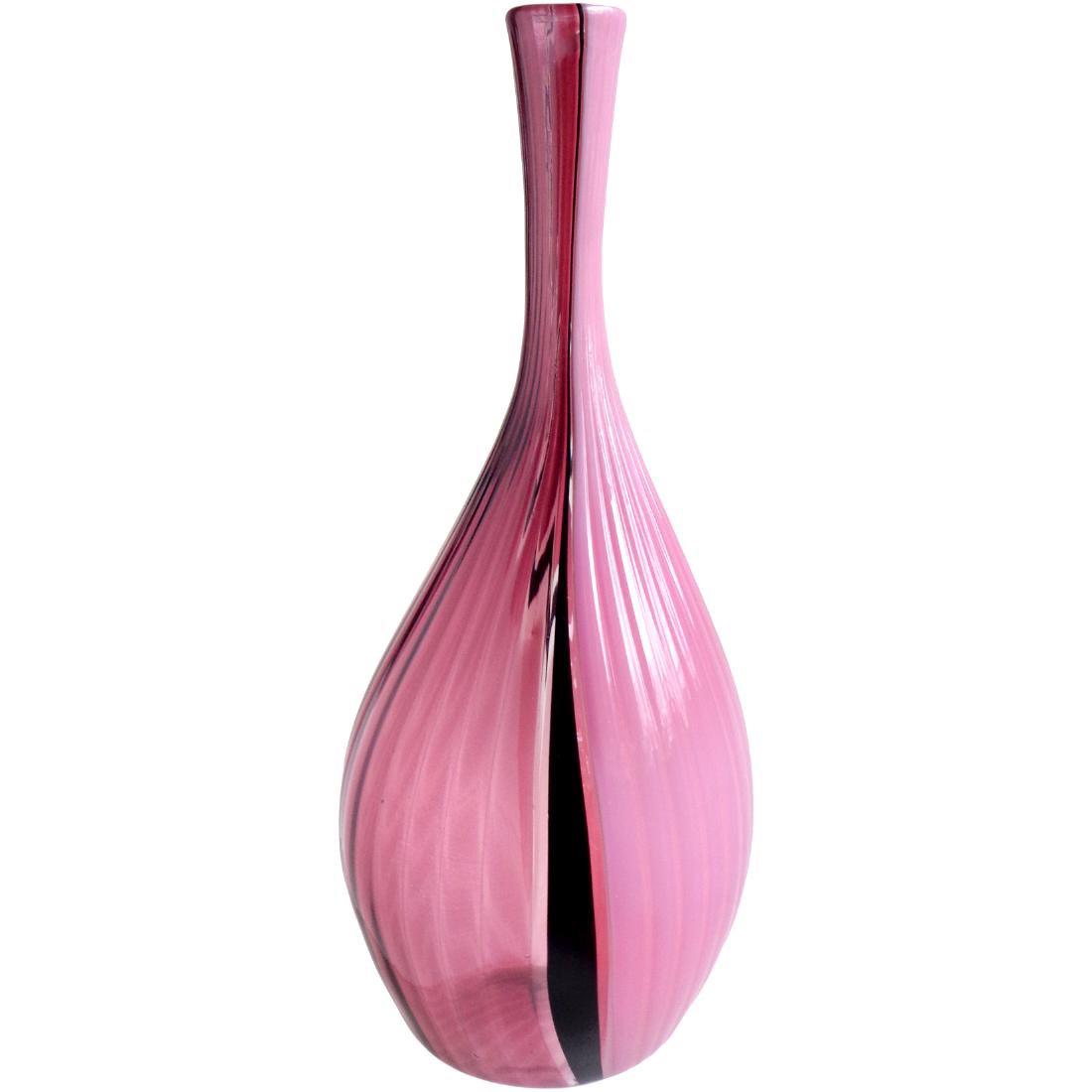 Murano Pink Purple Art Glass Flower Vase: Murano hand blown solid pink and clear purple art glass flower vase. Created in the manner of the Salviati company. The piece has a black dividing line, separating the 2 colors. Measures 11 3/4" tall.