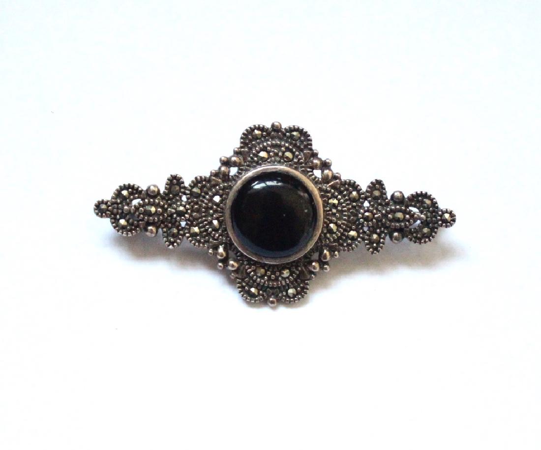 Sterling Silver, Hematite & Onyx Brooch: Item: Sterling Silver, Hematite & Onyx Brooch Maker: Unknown Origin: Unknown Date/Period: ca. 1970’s-90’s Materials: Sterling Silver Size: 2" Sterling Silver, Hematite & Onyx Brooch. Marked 925 Pl