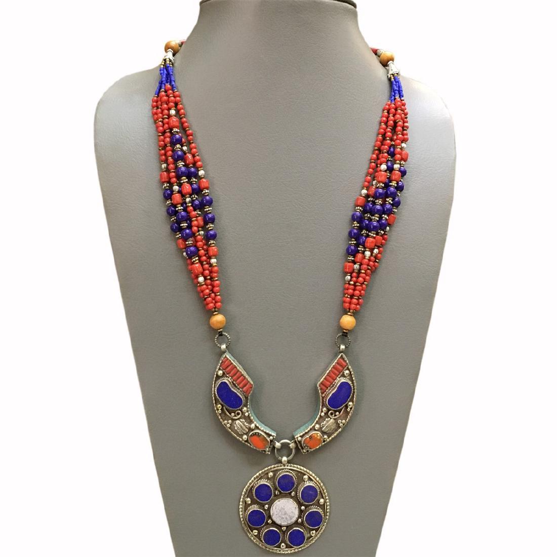 Tibetan Silver Lapis & Coral Handmade Necklace: Item: Nepalese Big Tibetan Silver Lapis & Coral Choker Handmade Necklace Origin: Tibetan Metal: Tibetan silver Gemstones: Turquoise & Coral Size (inches): 1-27 Please note that this lot has a confiden
