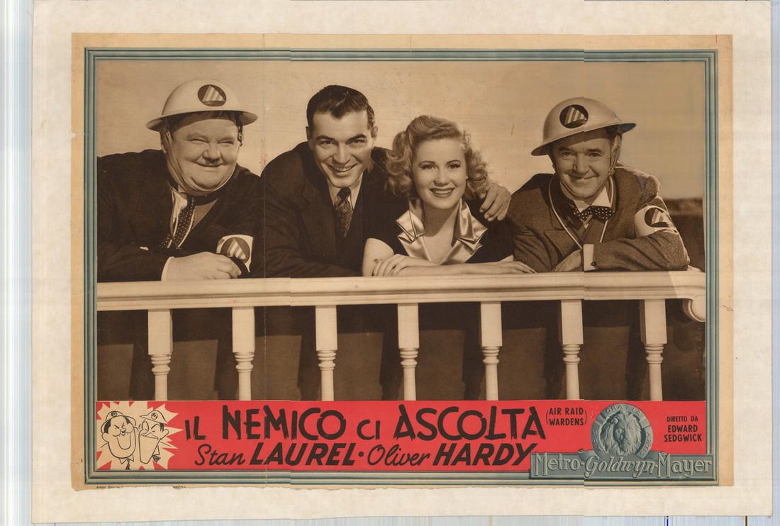 Laurel and Hardy 1943 Air Raid Wardens Poster: Pictured is a 19" x 24" linen-backed Italian busta poster for the 1943 Edward Sedgwick film Air Raid Wardens based on a screenplay by Martin Rackin, Jack Jevne, Charley Rogers and Harry Crane and star