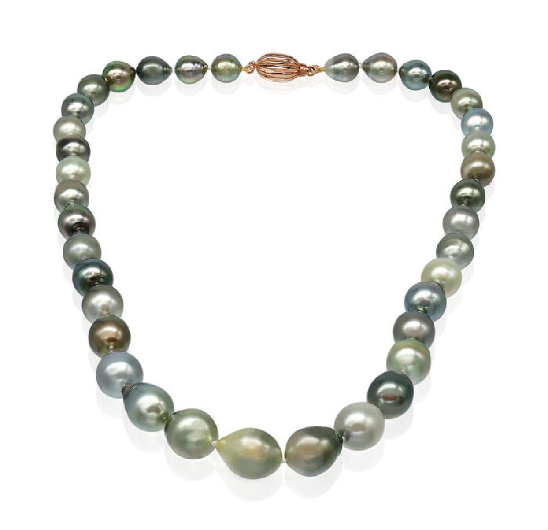 Multicolour Baroque Tahitian Pearl Necklace: Multicolour Baroque Tahitian Pearl Necklace Featuring a Rose Clasp - Authenticity Certificate Included. Emerging from the tropical lagoons of French Polynesia, these Tahitian pearls display a rainbow 