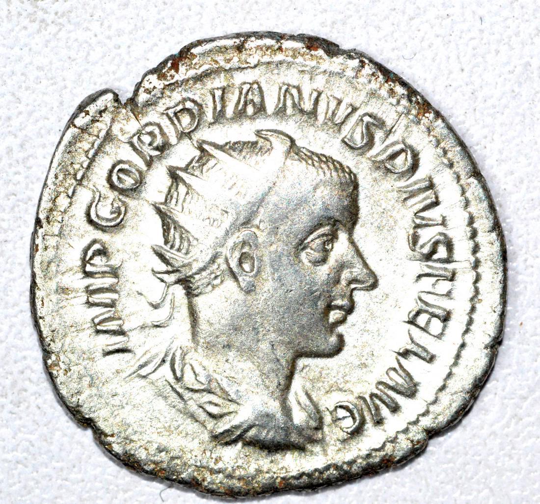 Roman AR Radiate of Gordian III, rv. Hercules: Date: 3rd C AD Material: silver Provenance: From an old British collectom, acquired on German and Austrian art markets. Dimensions: 23mm; 4.8grams Roman AR Radiate of Gordian III, rv. Hercules. Superb