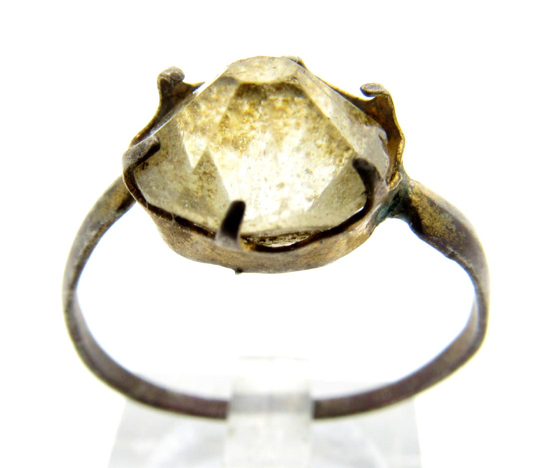 Antique Hallmarked Ring with Stone: Date: 17th - 19th C. AD Material: bronze Provenance: Obtained from an old British collection, acquired from the B.C.F. (Birmingham) Dimensions: 19mm; 1.7grams Antique Hallmarked Ring with Stone. Profe