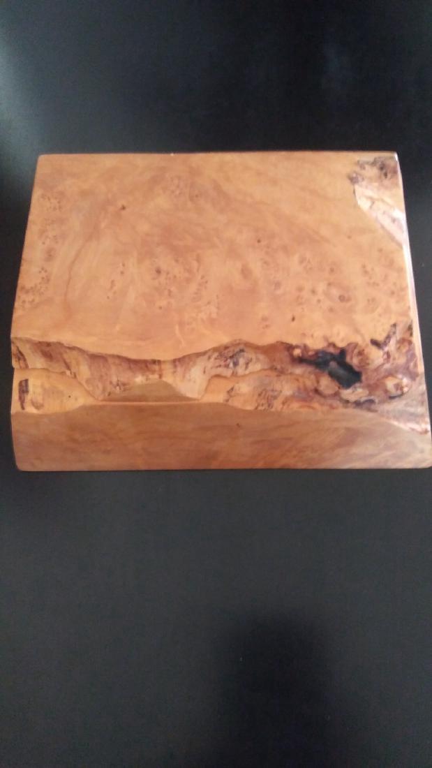 Bird's-eye Maple Burl-Wood Stash Box: Bird's-eye Maple Burl-Wood Stash Box. Comprised of two Linear Edges and two organically Formed edgesMichael Elkan7 1/2" x 4 3/4"x 2 1/4"1980'sSigned Michael Elkan bottom right Please note that this lo