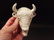 Cast Iron Folk Art Beer Soda Bottle White Buffalo - 2
