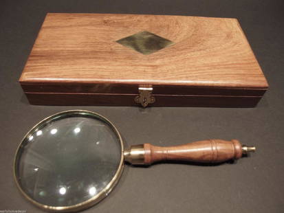 4" 5x Magnifying Glass Brass w Wood Turned Hand Lens: Box is 10 1/2" wide x 5 1/4" Mag Glass is 5x magnification 4" Wide 9" Long Nice reproduction of an antique Magnifying glass with wood box. Magnifying glasses like this were used in the 18th and