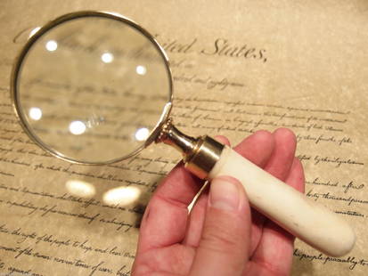 3" Brass Bone Handle Magnifying glass Desk Magnifier: 7 1/2" Long x 3" Wide Nice reproduction of an antique! This piece is made just like the early versions with glass, brass, and actual ox or cow bone. Very sturdy not flexible. Good quality for any