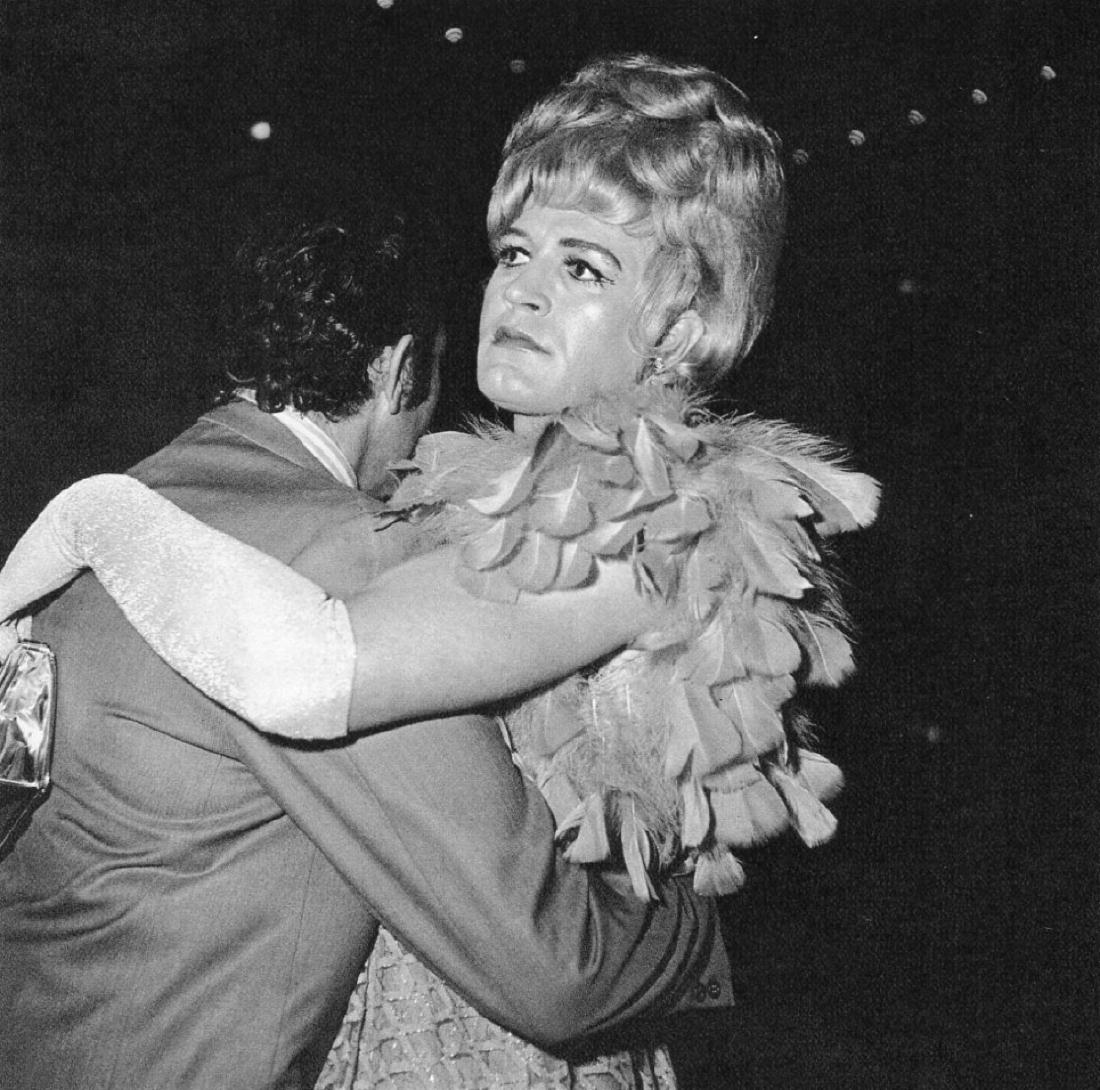 DIANE ARBUS - Two Men Dancing: Artist: DIANE ARBUS Print Title: Two Men Dancing, Drag Ball, NYC Medium: Sheet-fed Gravure Printing Date: 1972 Printed in Switzerland Image Size: 7 x 7 inches Diane Arbus was an American photographer 