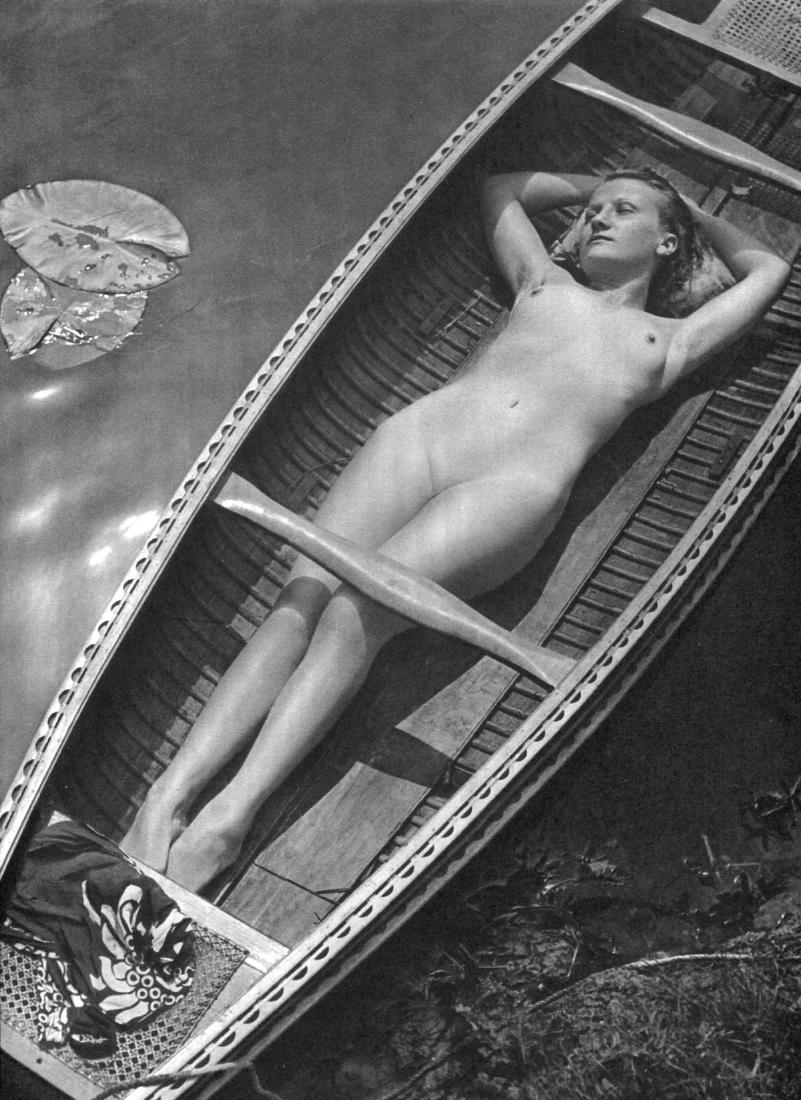 PIERRE BOUCHER - Nude in a Canoe: Artist: PIERRE BOUCHER Print Title: Nude in a Canoe Medium: Sheet-fed Gravure Printing Date: 1949 Printed in France Image size approx. 9.25 x 12 inches Pierre Boucher (1908 - 2000) Is a French photogr