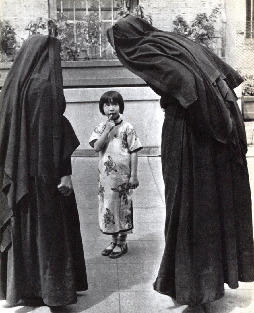 ALFRED EISENSTAEDT - Young Girl with Nuns: Artist: ALFRED EISENSTAEDT Print Title: Young Girl with Nuns Medium: Sheet-fed Gravure Printing Date: 1936 Printed in the USA Image Size: 7.5 x 9.25 inches Alfred Eisenstaedt (1898-1995)was a German-b