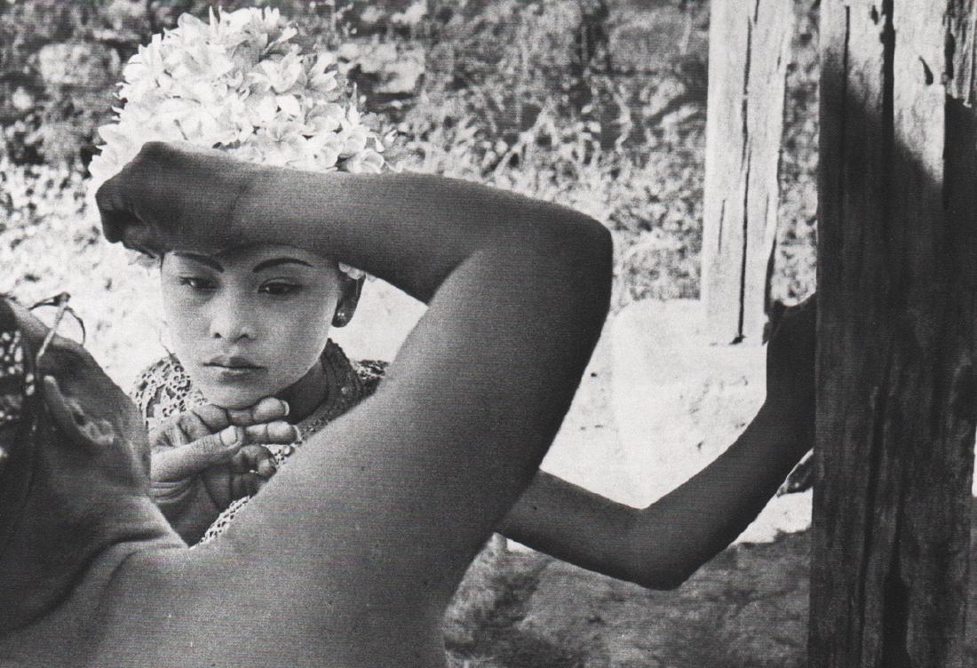 ERNST HAAS - Bali 1956: Artist: ERNST HAAS Print Title: Bali 1956, Balinese Girl getting ready for ceremonial dance Medium: Sheet-fed Gravure Printing Date: 1972 Printing Location: France Image Size: 7 x 5 inches Ernst Haas(