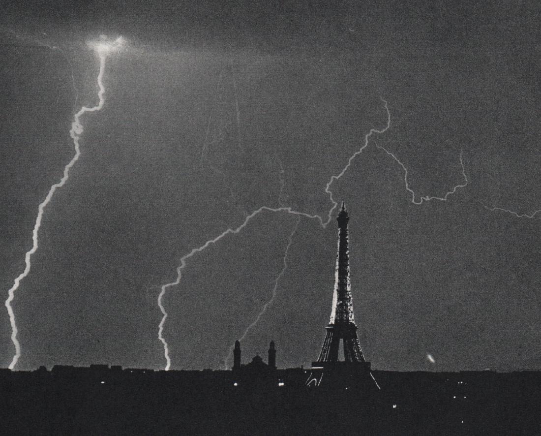 ANDRE KERTESZ - Paris 1926, Eiffel Tower: Artist: ANDRE KERTESZ Print Title: Paris 1926, Eiffel Tower and Lightning Medium: Sheet-Fed Gravure Printing Date:1968 Printed in Holland Image size approx. 6.5 x 5 inches Andre Kertesz(1894-1985) bor