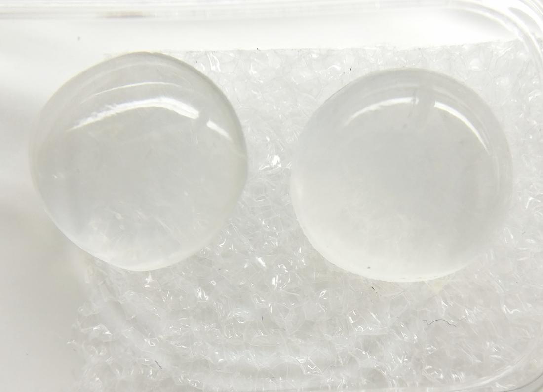 4.49 Carat Lot of Loose Orthoclase Moonstone Colorless: Item: Couple of Orthoclase " Moonstone " Colorless 4.49 ct Loose Gemstone: Orthoclase "Moonstone" Shape: Round Cabochon Color: Colorless Clarity: Adularescene effect is visible Carat Weight: 4.49 Size