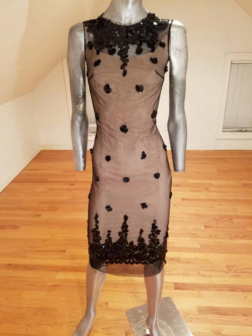 Vintage 1940's Illusion Wiggle Cocktail Dress: Vintage 1940's Illusion wiggle Cocktail dress Tulle/Sequins metal zip. A true beauty a wiggle illusion tulle cocktail dress with a silk crepe under dress metal back zip and large black sequins In very