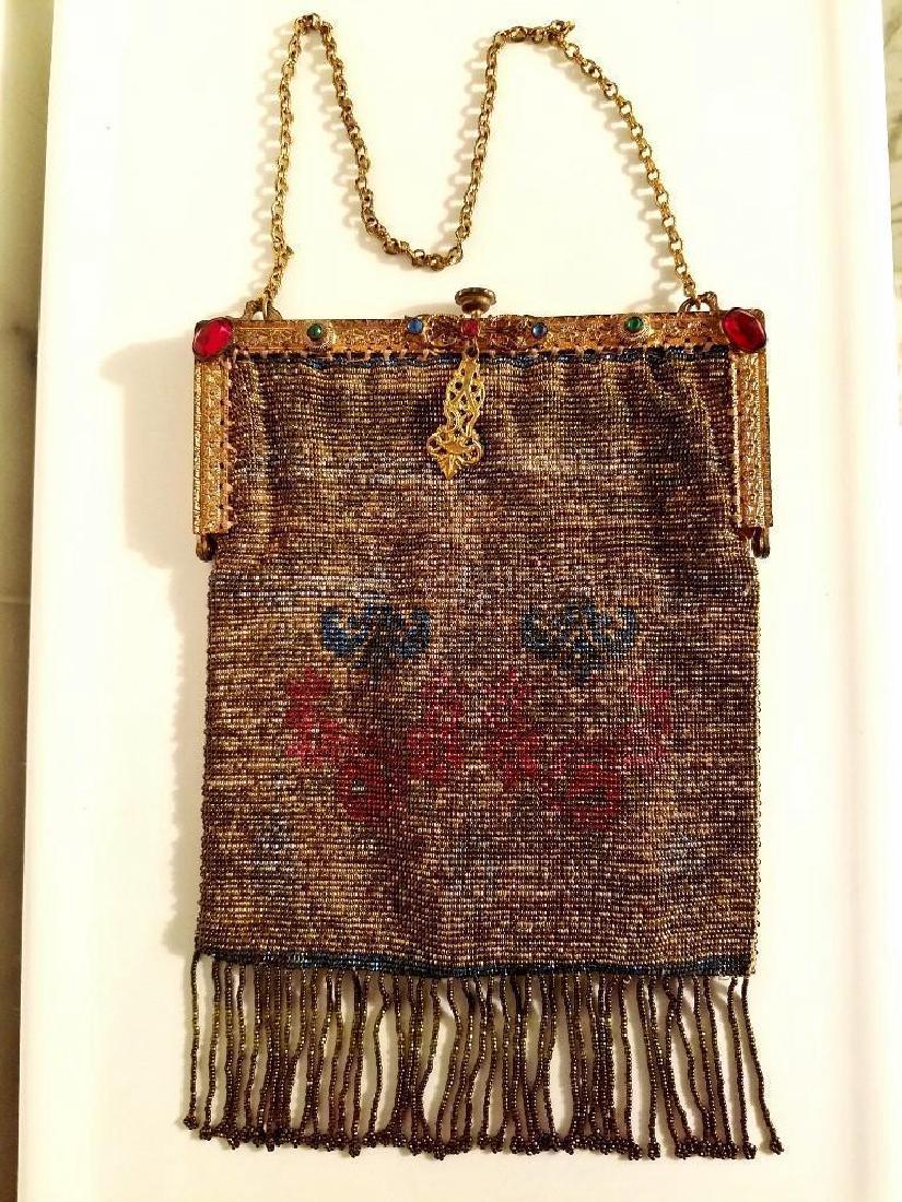 Antique Edwardian French Jeweled Beaded Gilded Bag: Antique edwardian French Jeweled micro beaded gilded bag w/fringes. Purchase in a Private Estate in L'ille France. regal Crest pattern with gold and brass micro beads with brass colored fringe. The br