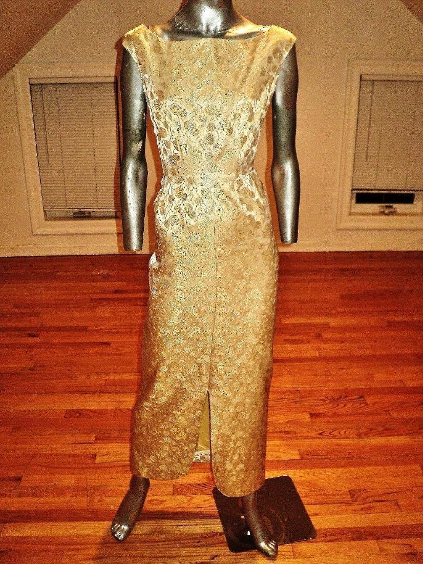 Vintage 1950's Gold Lame' Brocade Cocktail Maxi Gown: Vintage 1950's Gold lame' brocade cocktail maxi hostess gown. This is an amazing gold Lame' embroidered brocade metallic fabric in a Hostess gown front slit detail and plunge back rounded slit with me