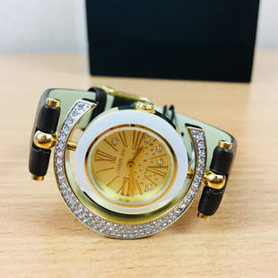 Cerruti Ladies Rotonda Gold Plated Watch with Swarovski: Cerruti – Ladies Rotonda Gold Plated Swiss Made Watch with Swarovski ElementsCASE MATERIAL: Gold Plated Stainless SteelDISPLAY: AnalogueSTRAP COLOUR: BrownSTRAP MATERIAL: LeatherGLASS: Mineral