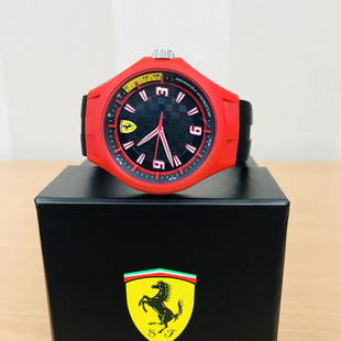 Scuderia Ferrari – Men’s Wrist Watch – New With Box: Ferrari Men's watch. Features a 43mm wide and 13mm thick plastic case with a fixed bezel and textured push-pull crown. This watch is powered by an accurate quartz movement. Scratch resistant mineral