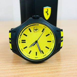 Scuderia Ferrari – Men’s Wrist Watch – New With Box: Ferrari Men's watch. Features a 43mm wide and 13mm thick plastic case with a fixed bezel and textured push-pull crown. This watch is powered by an accurate quartz movement. Scratch resistant mineral