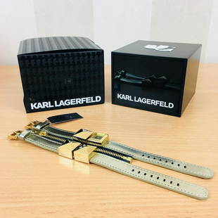 KARL LAGERFELD – Ladies Designer Luxury Watch: Movement:Quartz Model: KL2009Case material: Plated Stainless Steel Dial color:Gold tone Water resist.:330 Feet Band material:LeatherCrystal:MineralCase size:20.0 mm (excluding crown) Standard