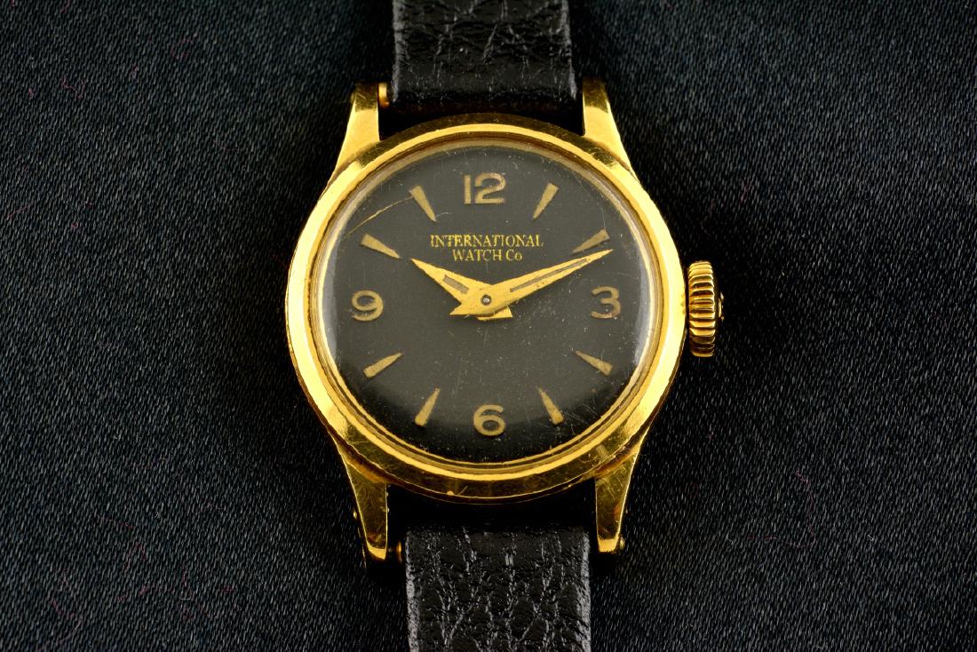 IWC Schaffhausen 18K Gold Black Dial Manual Watch: Watch: IWC International Watch Co Schaffhausen - Gold - 18K Brand: IWC Metal: Gold Case Size: 21mm Bracelet Length: 10cm Movement Type: manual International Watch Co., also known as IWC, is a luxury S