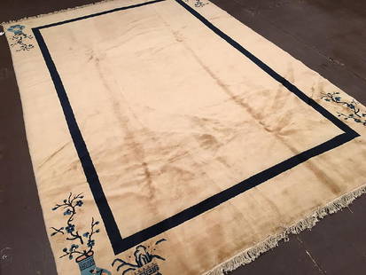 Chinese Rug 10.9x6.7: Chinese RugGreat reproduction of 19 Century Peking rug. Hand knotted in China.China10.9x6.7 feet3.20x2.01 metersWool pile Please note that this lot has a confidential reserve. When you leave a bid