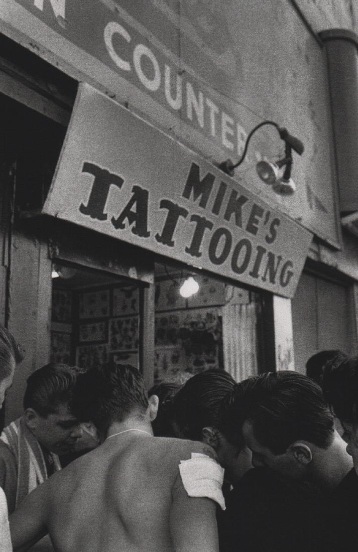 BRUCE DAVIDSON - Mike's Tattooing: Artist: BRUCE DAVIDSON Print Title: Mike's Tattooing Medium: Sheet-fed Gravure Printing Date: 1998 Printing Location: Japan Image Size: 5.5 x 8 inches Bruce Davidsonis an American photographer. He has