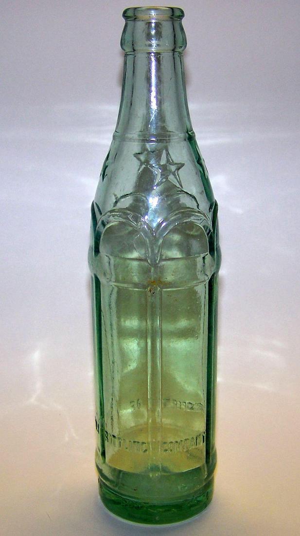 Vintage Coca-Cola Soda Bottle: Vintage Coca-Cola Bottling Company manufactured by the Root Glass Company of Terre Haute, Indiana. 1901-1932. Coca-Cola has a rich beverage history in America starting originally as a fountain beverag