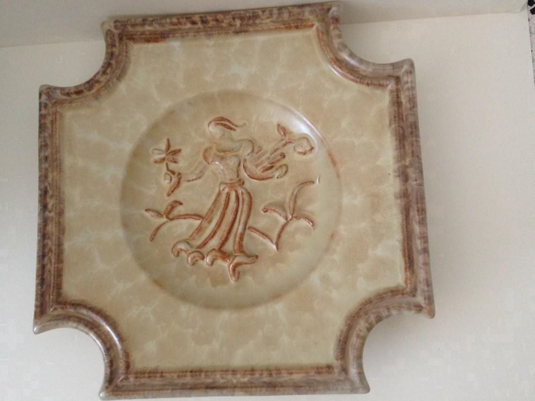 Upsala Ekeby Art Plate: 12" glazed decorative plate with raised figurine design - Attr. Jais Nielsen Please note that this lot has a confidential reserve. When you leave a bid in advance of the auction, submit your maximum.