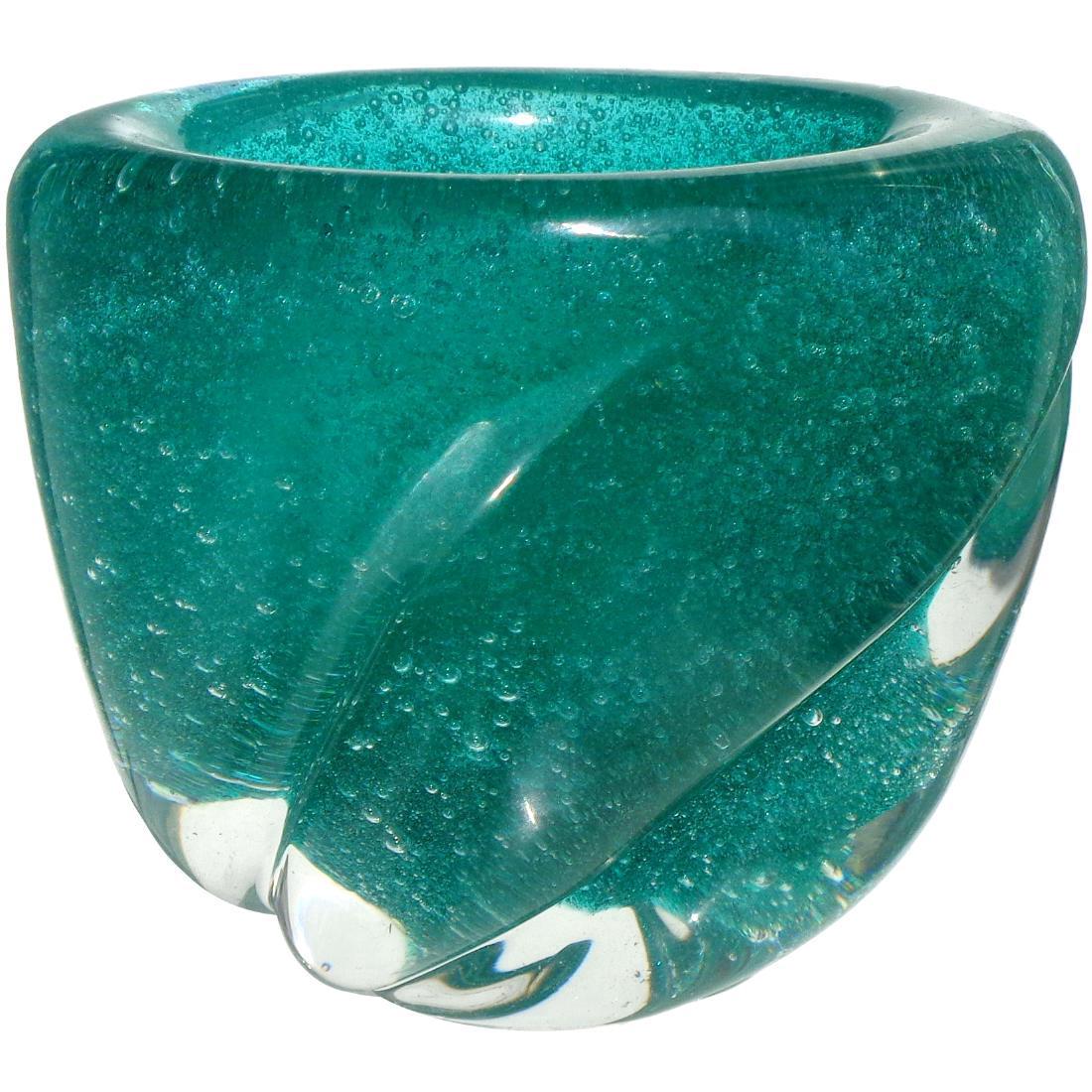 Murano Pulegoso Green Art Glass Cigarette Holder: Origin: Murano, Italy Date/Period: Mid Century Modern Materials: Glass Size: 2 3/4" x 3 1/2" x 2 3/4" Murano hand blown Pulegoso green swirl art glass cigarette holder or ring dish. Attributed to the 