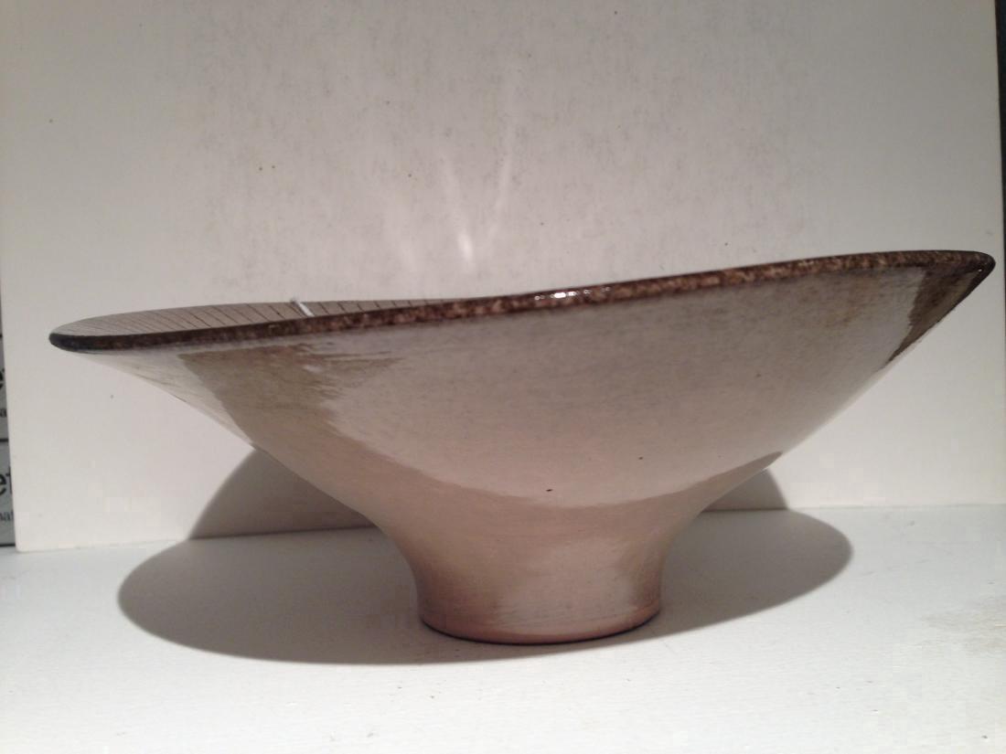 Upsala Ekeby Bowl: 8" Upsal Ekeby footed bowl by Vicke Lindstrand stamped "Sweden" etched UE VL on the base Shipping: Domestic: Flat-rate of $20.00 to anywhere within the contiguous U.S. International: Foreign shipping