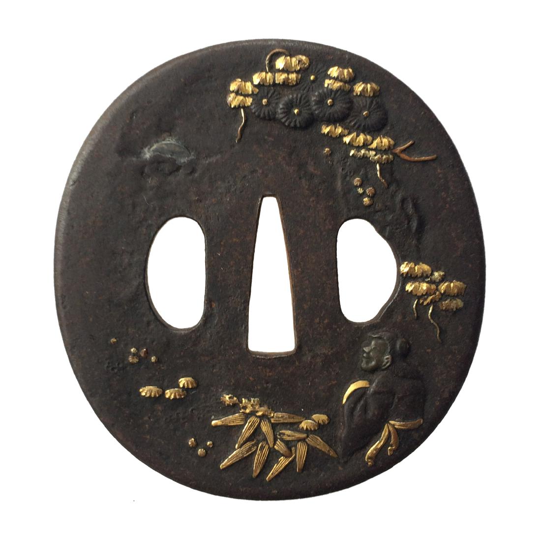 Iron tsuba carved and inlaid with shibuichi and gold: Item: Iron tsuba carved and inlaid with shibuichi and gold Origin: Japan Date: Edo period Materials: Iron, shibuichi, gold Height: 72.8 mm; Width: 68.0 mm; Thickness: 3.1 mm; Weight: 91 g An oval form