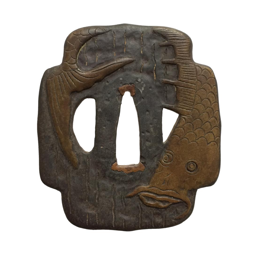 Iron tsuba carved and inlaid with brass: Item: Iron tsuba carved and inlaid with brass Origin: Japan Date: Edo period Materials: Iron, brass Height: 75.0 mm; Width: 70.1 mm; Thickness: 2.8 mm; Weight: 89 g Cross-shaped mokko form iron tsuba 