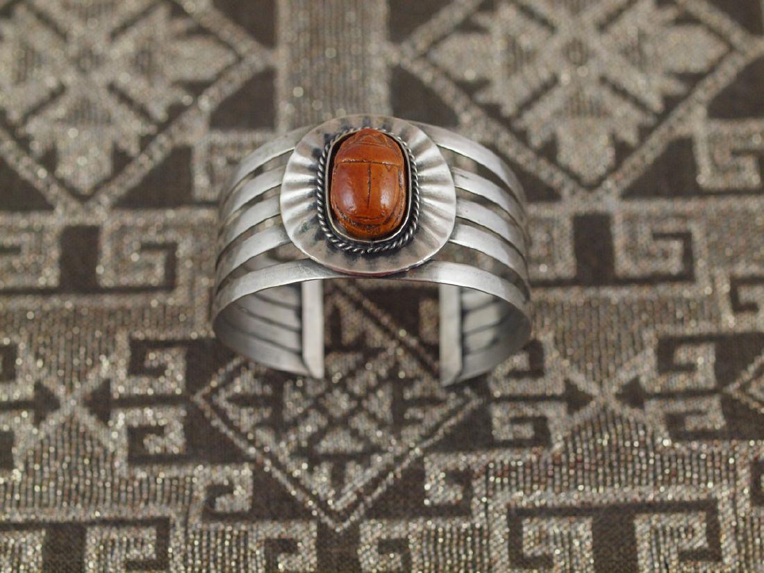 Rigid Silver Bracelet Beetle Antique Egypt, 1920s: Title:Rigid silver bracelet Beetle Antique Egypt Date/Period:1920s Materials: Gemstones: Very beautiful rigid silver bracelet original of 1920s. The bracelet is richly decorated with a carved stone in