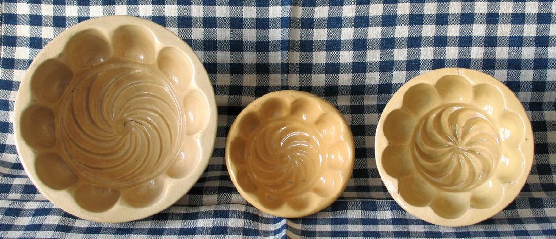 Group of Three Vintage Yelloware Swirl Molds (1 of 3)