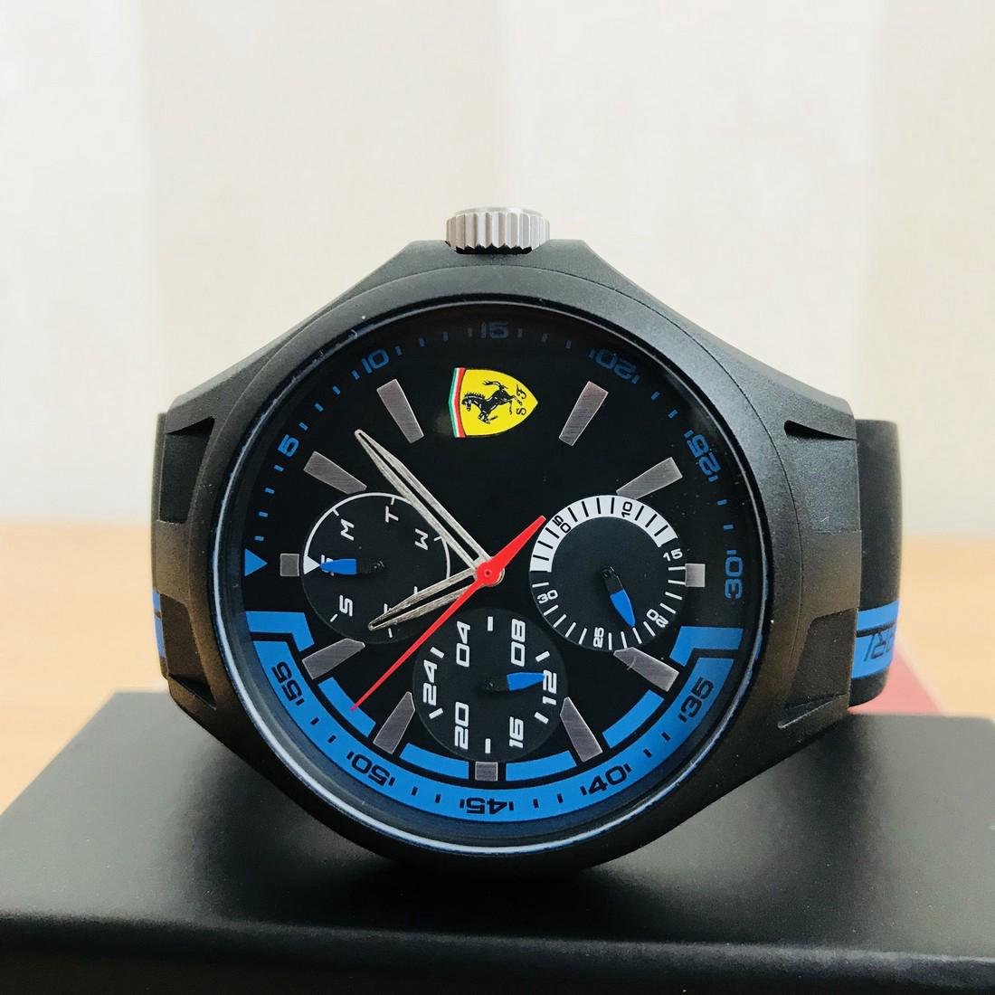 Scuderia Ferrari – Men’s Wrist Watch – New With Box: Ferrari Men's watch. Features a 43mm wide and 13mm thick plastic case with a fixed bezel and textured push-pull crown. This watch is powered by an accurate quartz movement. Scratch resistant mineral c