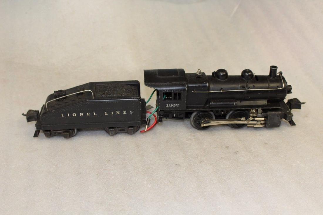 Lionel Prewar 1662 Engine 2203T Tender 1940 Version: Lionel Prewar 1662 Engine 2203T Tender 1940 Version. The engine is missing one marker light. Looks to be complete otherwise. You get what is pictured. See all the photos for the exact condition of thi