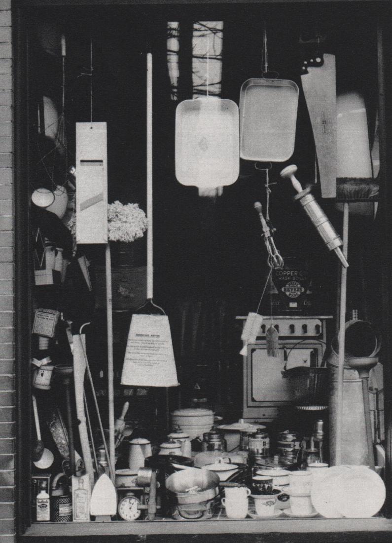WALKER EVANS - Store Window: Artist: WALKER EVANS Print Title: Store Window Medium: Sheet-fed Gravure Printing Date: 1972 Printed in Switzerland Image Size: 4.75 X 6.75 inches Walker Evans (1903-1975) was an American photographer