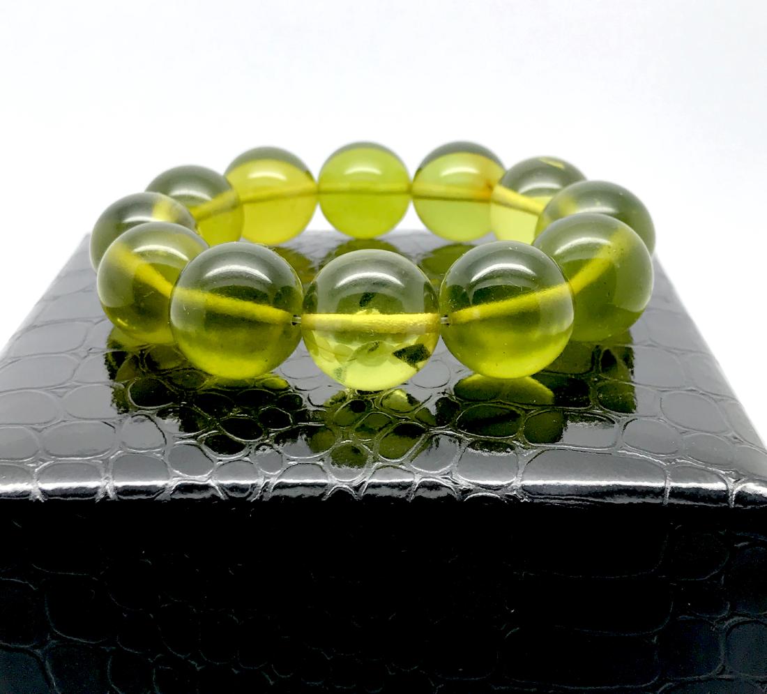 Cut young amber beads bracelet 24.6 gr (1 of 9)