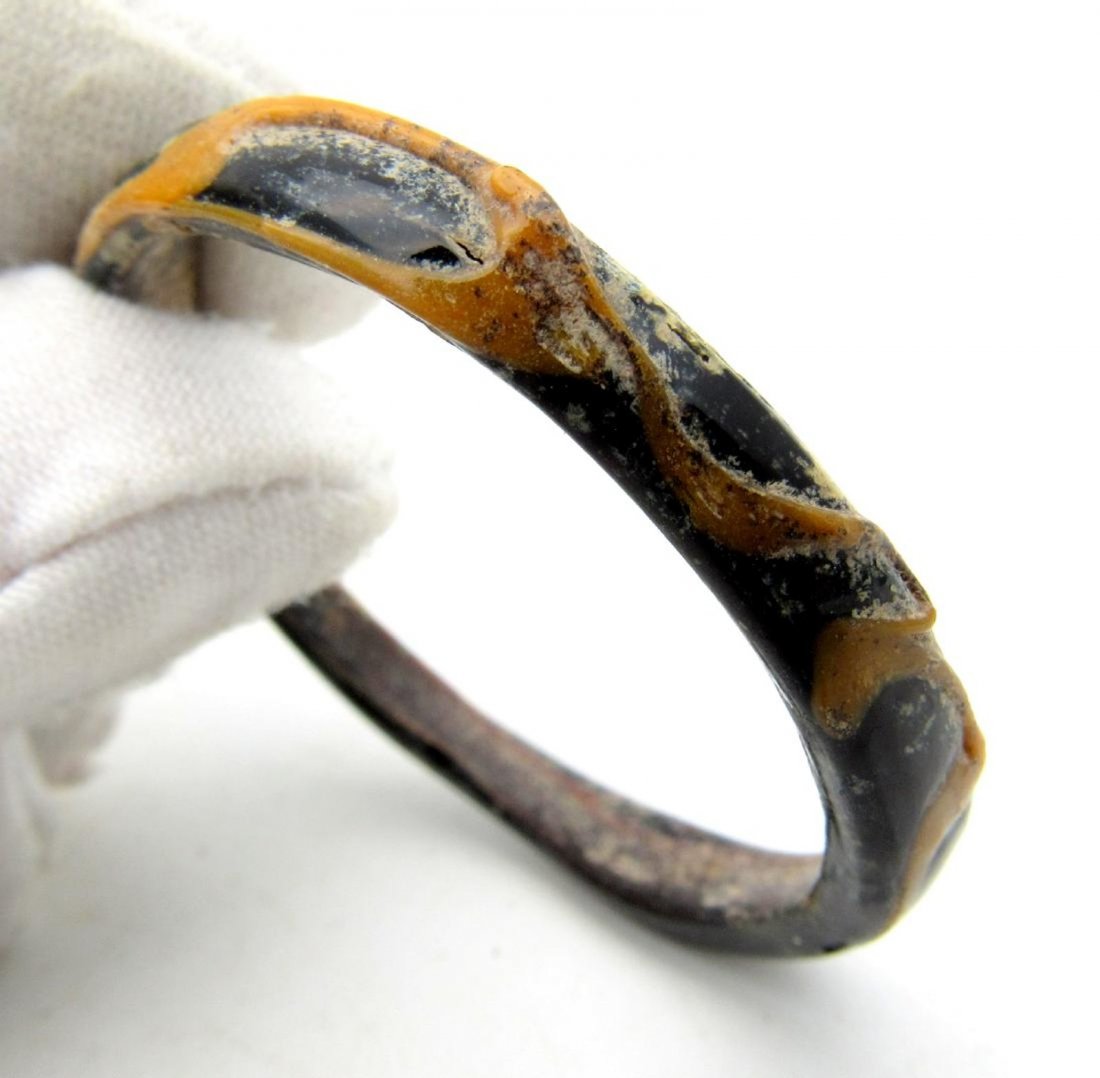 Ancient Byzantine Glass Bracelet: Date: Circa 7th - 9th c. AD Material: glass Provenance/Additional Information: Obtained from an old Austrian collection, purchased from a private collector in Vienna. Dimensions: 35mm; 3.9grams Ancien